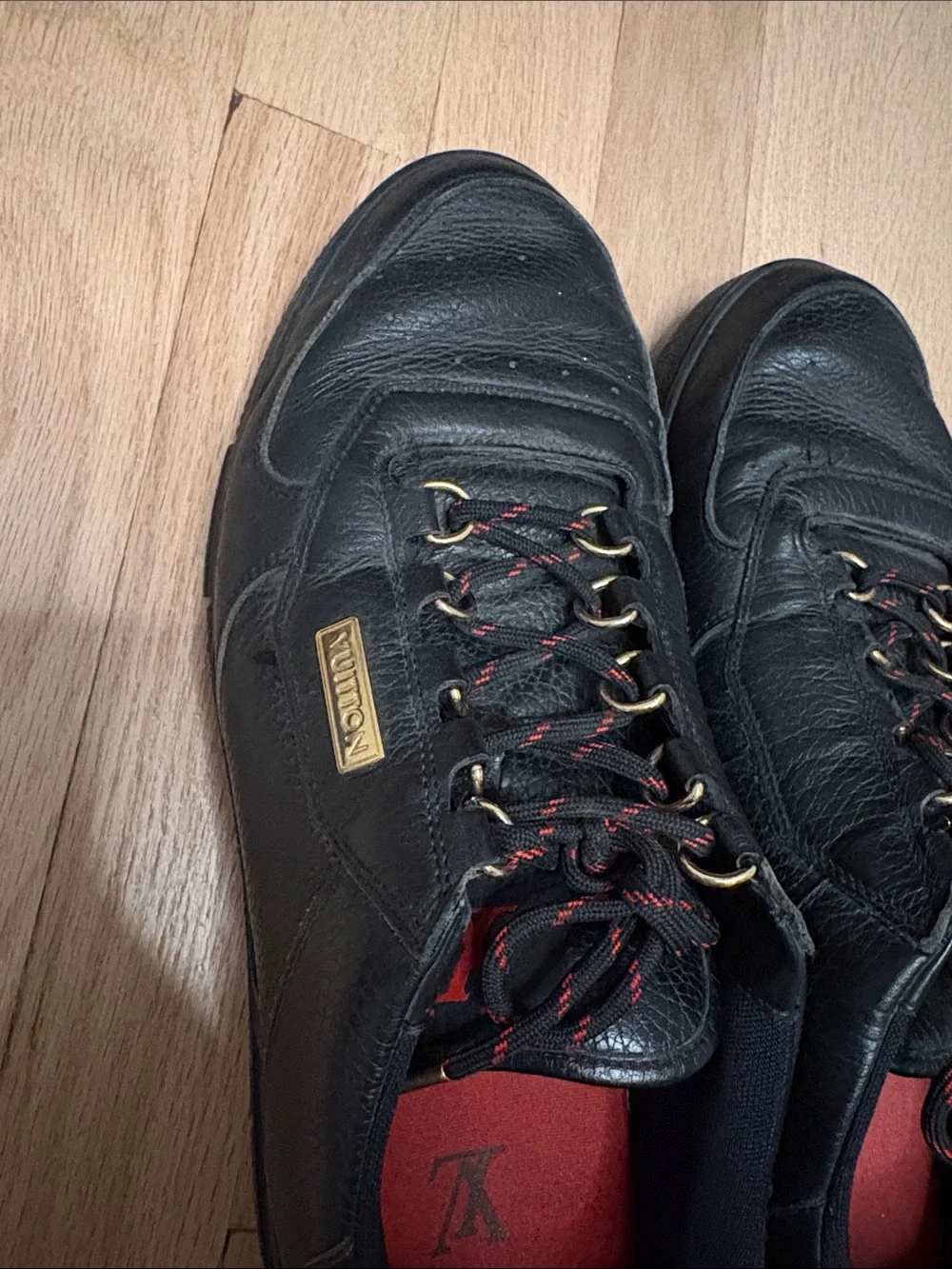 Louis Vuitton Black Leather Men's Sneakers with Red Insoles and Gold Accents